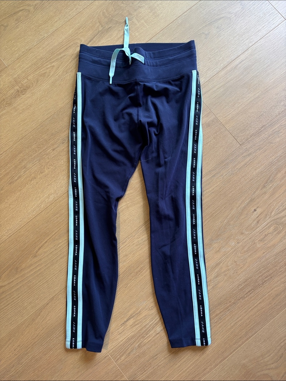 Lorna Jane Navy Active Leggings with bay blue Side Stripe ankle street biter